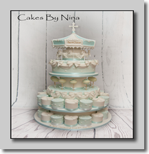 10" carousel cake - �195, cake pops �4.50 each mini cakes �9.50 each, custom made stand �55, packaging to take all the cakes away in �25 stand holds 30 mini cakes and 10 cake pops